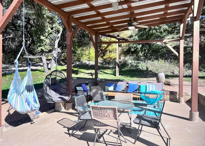Heated pool and hot tub area at Camp Sandy